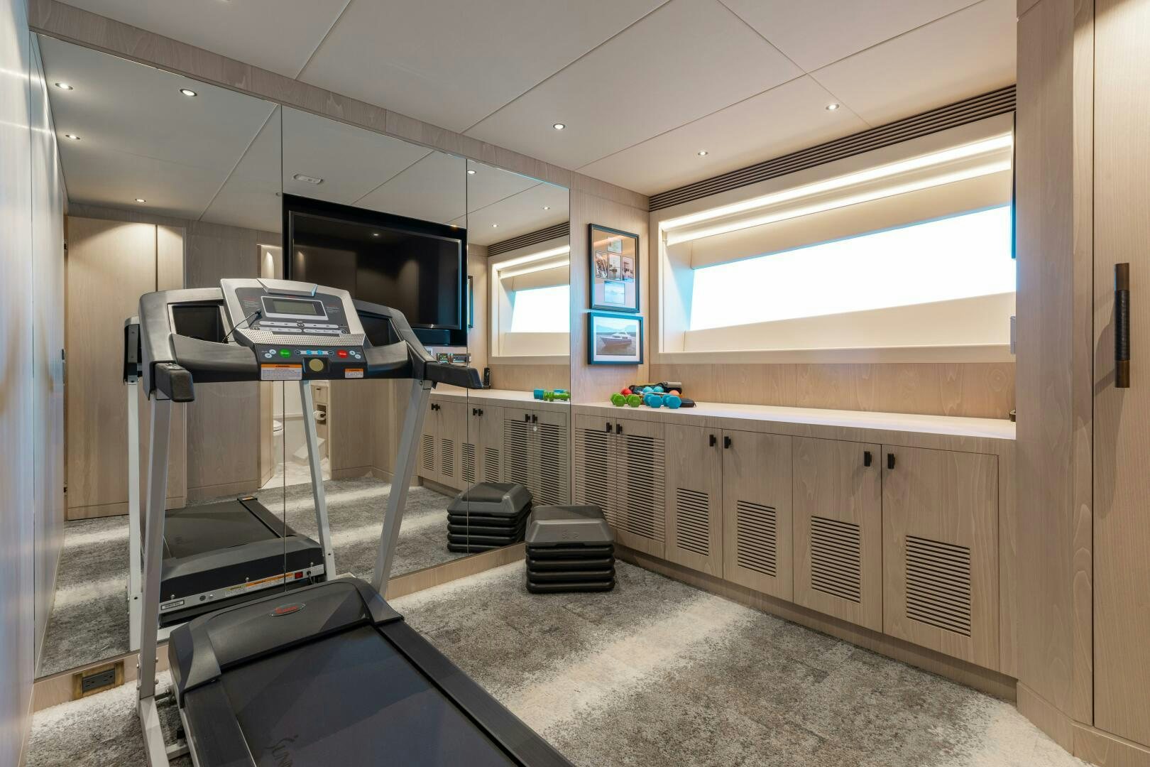 a room with a machine and a printer aboard UNTETHERED Yacht for Sale