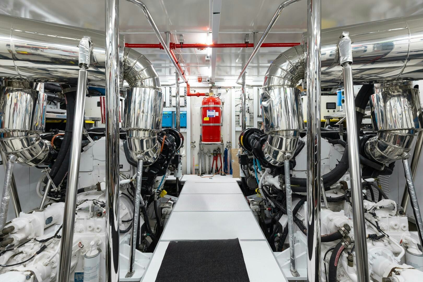 a room with pipes and equipment aboard UNTETHERED Yacht for Sale