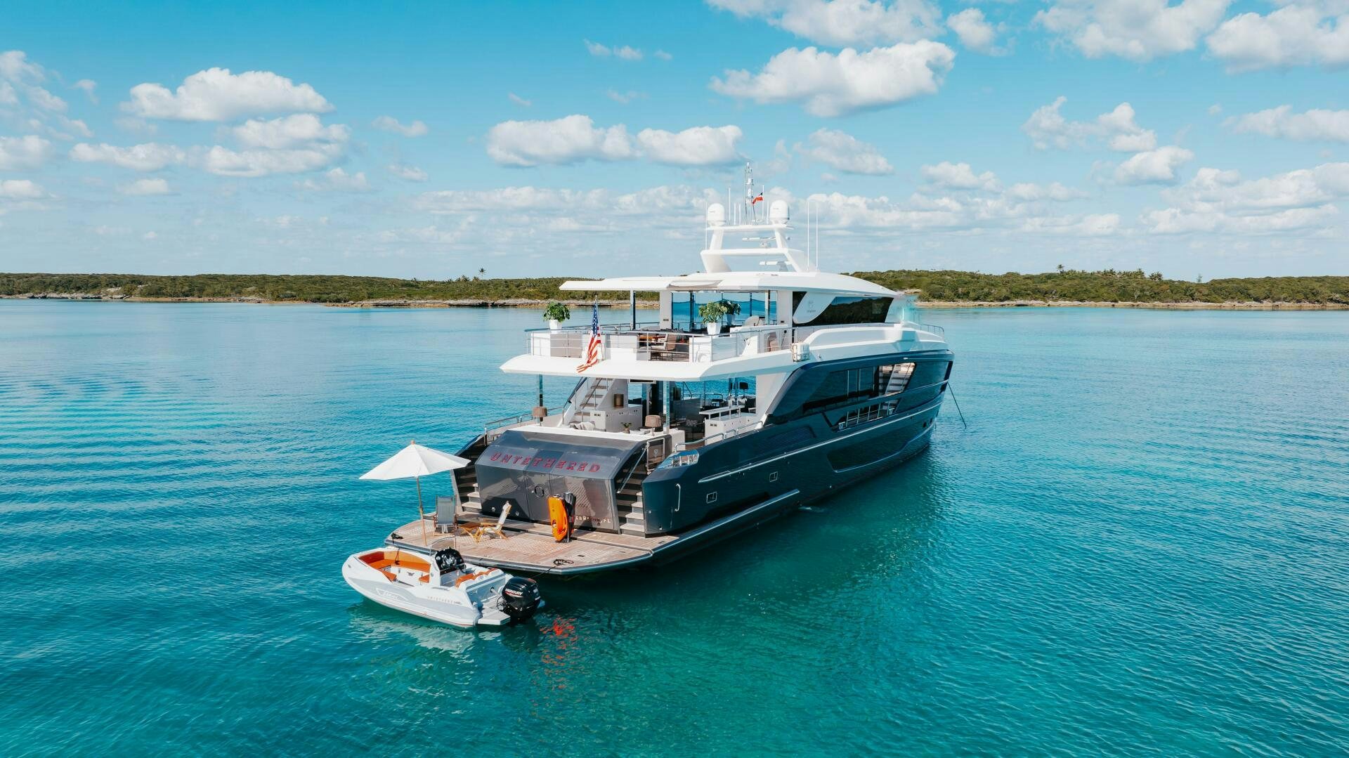 a boat on the water aboard UNTETHERED Yacht for Sale