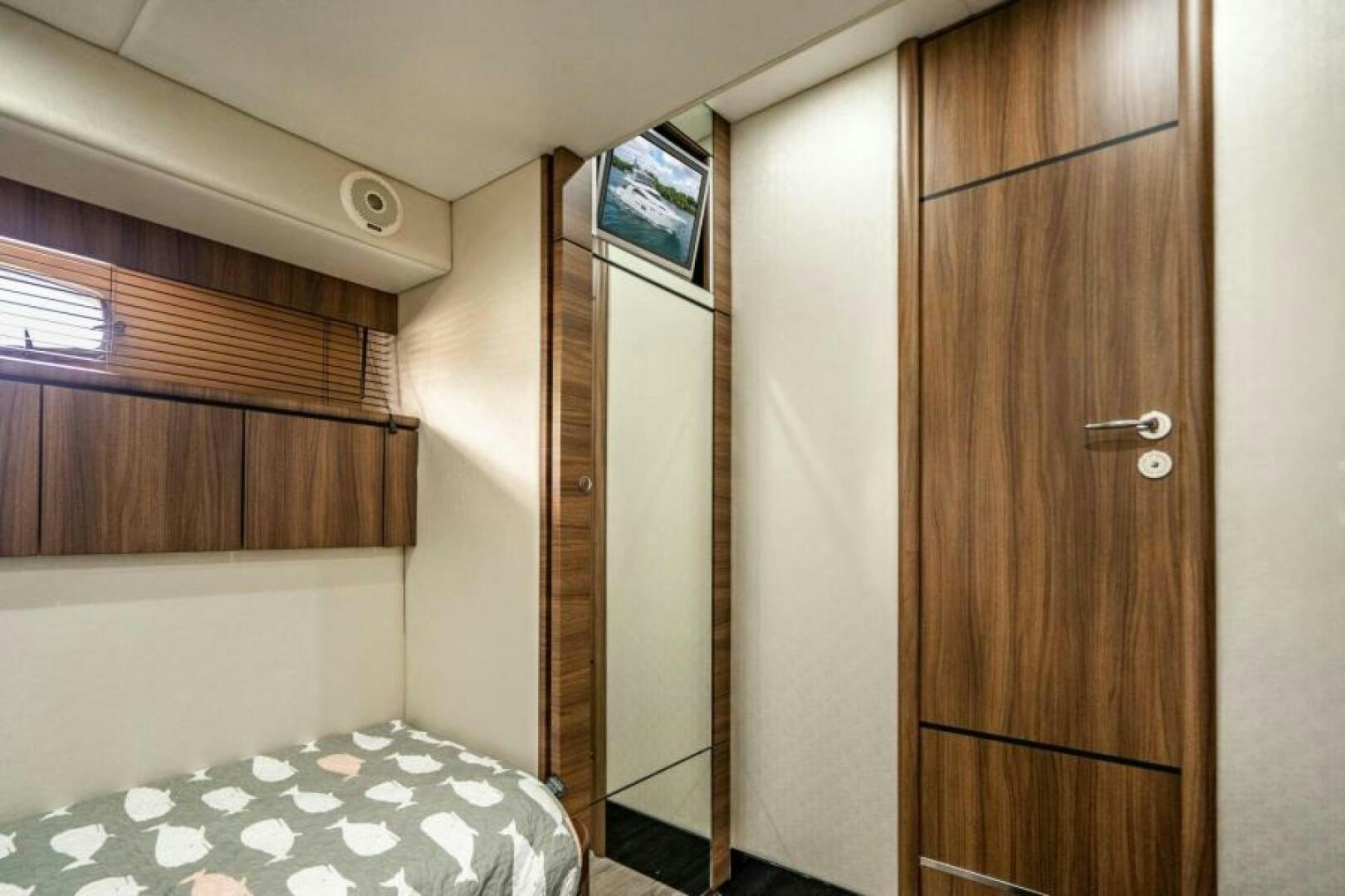 a bed in a room aboard AQUABELLA Yacht for Sale