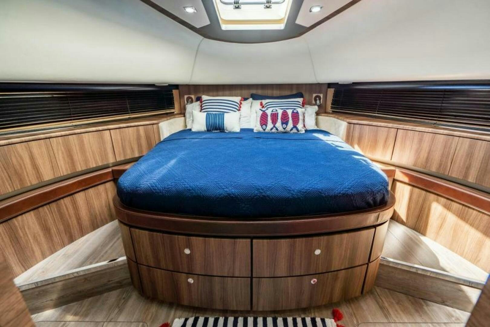 a bed in a room aboard AQUABELLA Yacht for Sale