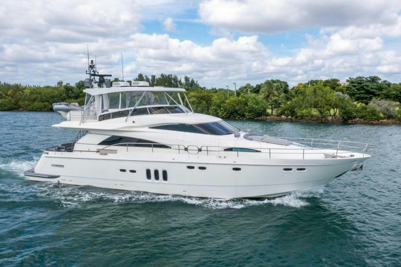 a white yacht in the water aboard AQUABELLA Yacht for Sale