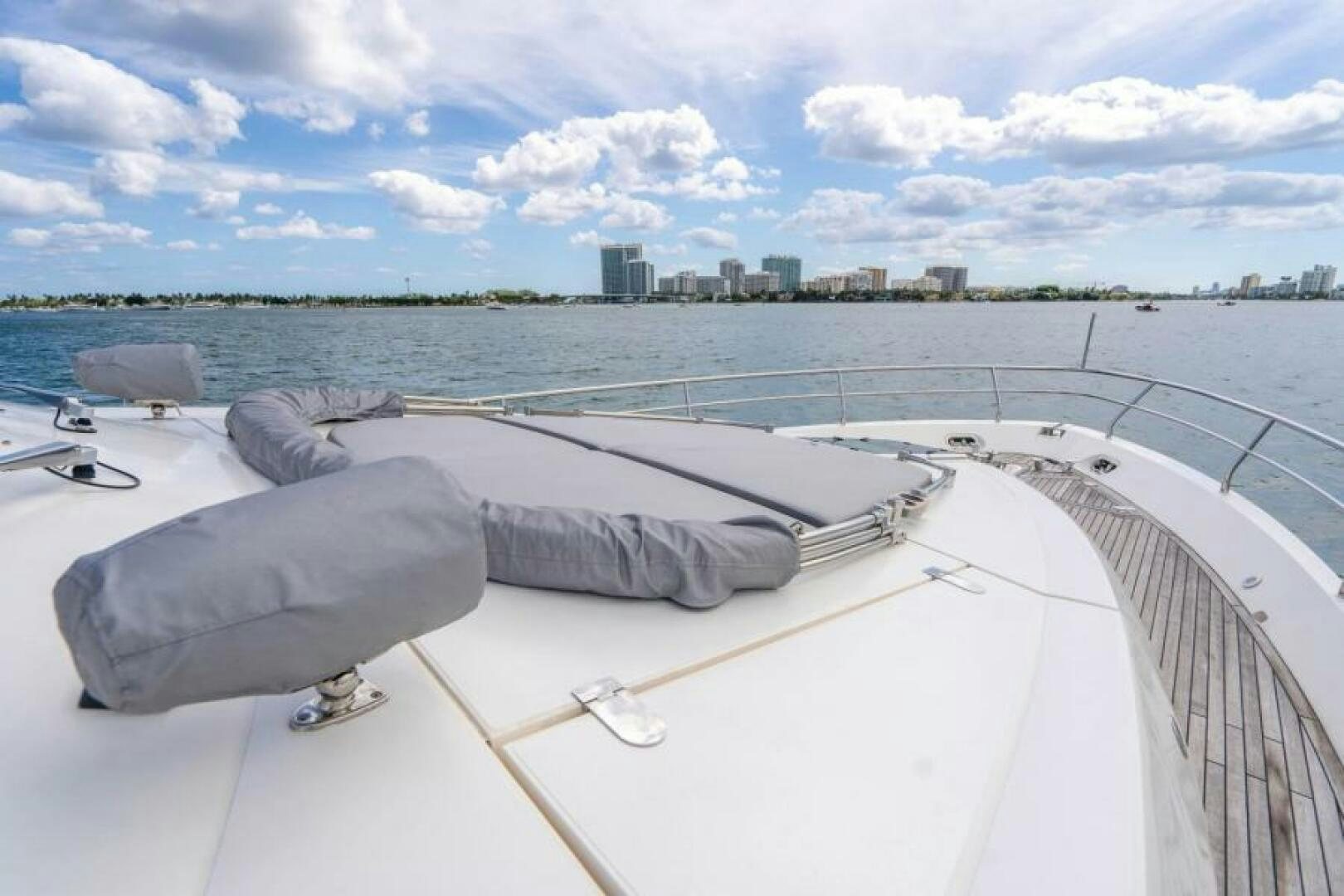 a deck with a view of a city and water aboard AQUABELLA Yacht for Sale