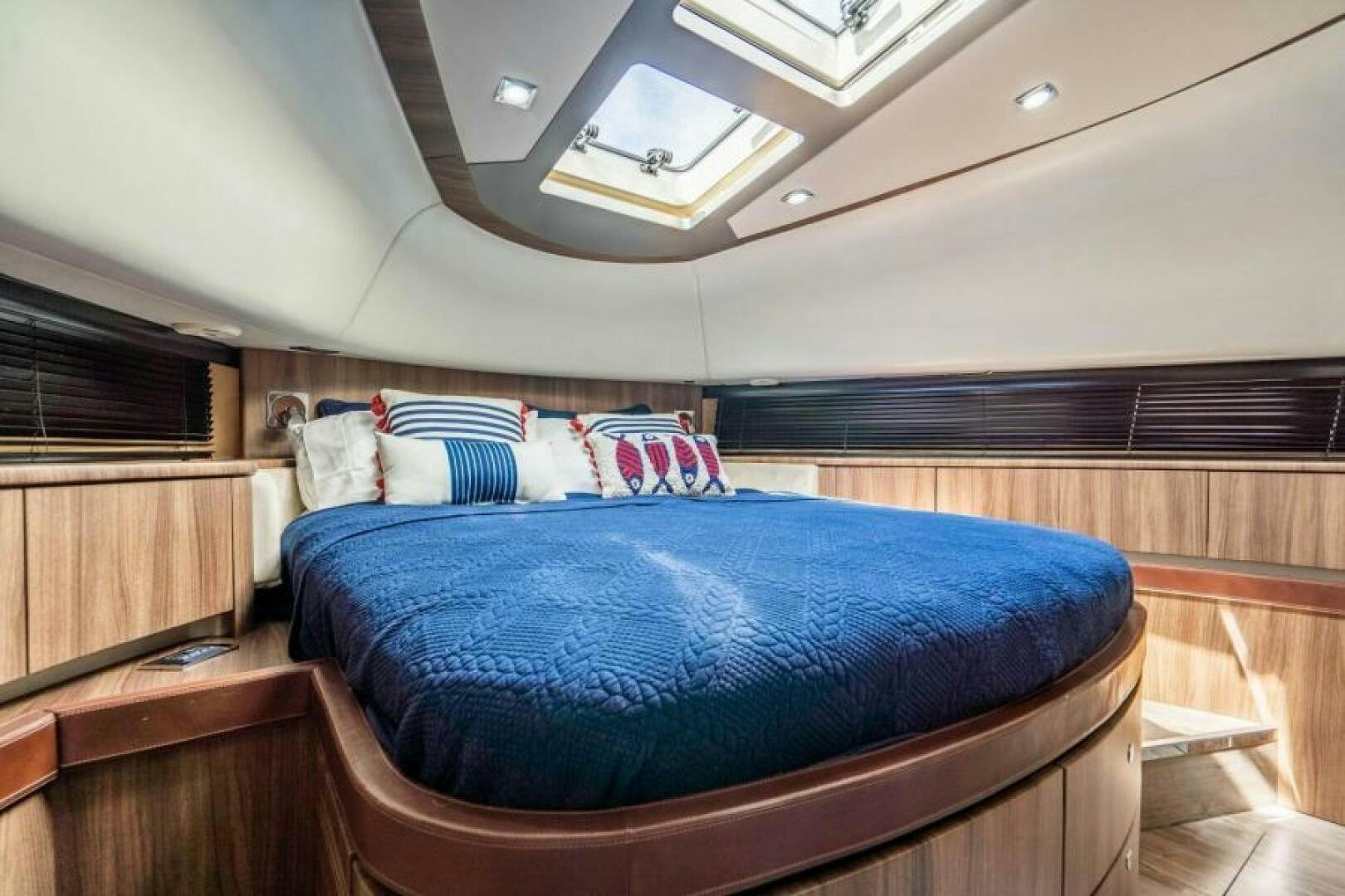 a bed in a room aboard AQUABELLA Yacht for Sale