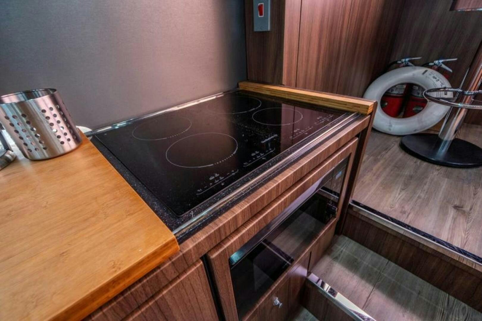 a record player on a table aboard AQUABELLA Yacht for Sale