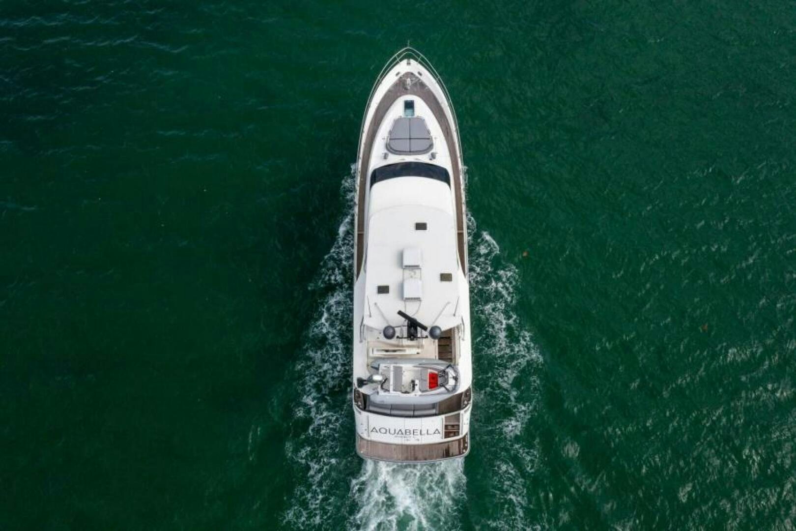 a white and black boat in the water aboard AQUABELLA Yacht for Sale