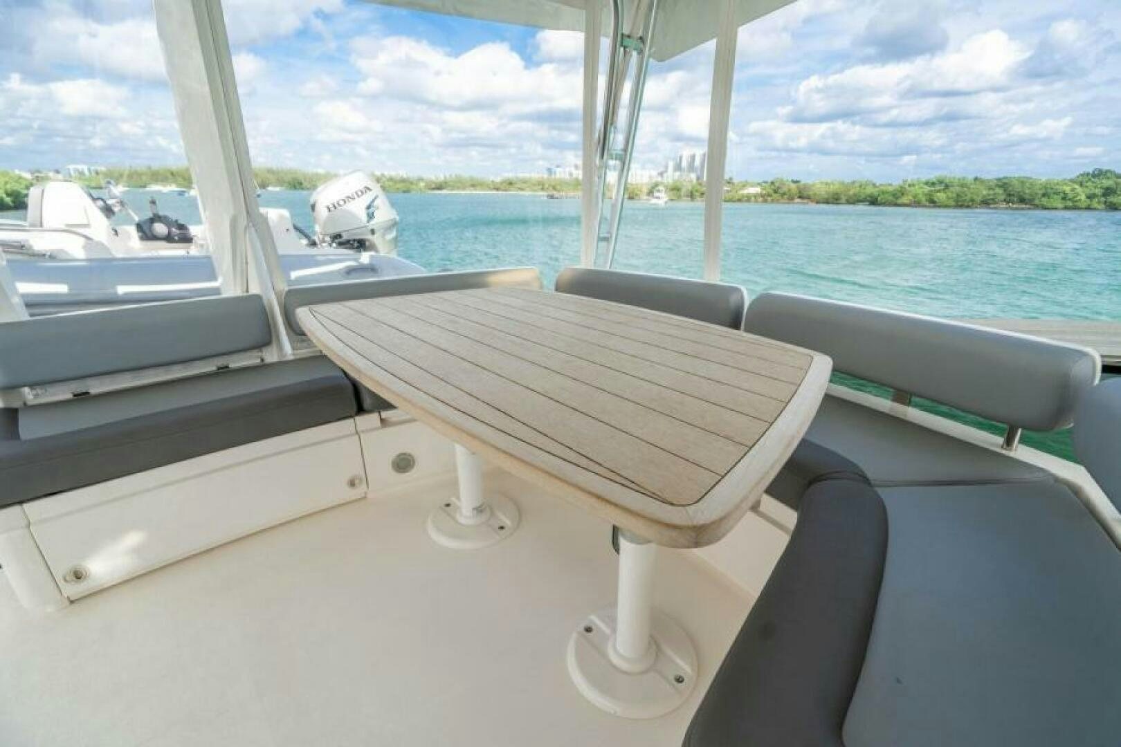 a boat with a bench aboard AQUABELLA Yacht for Sale