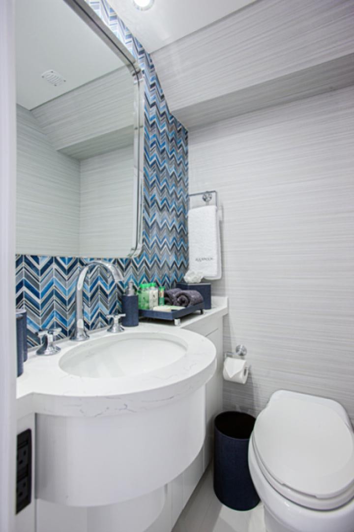 a bathroom with a sink and a toilet aboard HANNAH Yacht for Sale