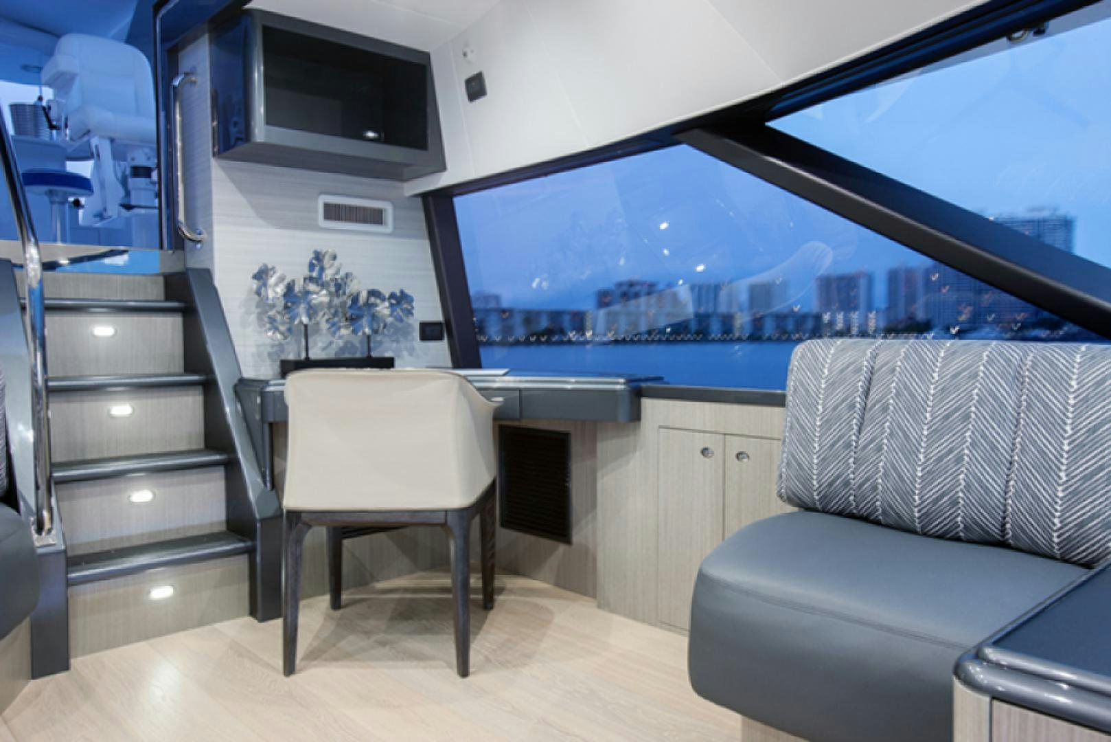 a room with a couch and a tv aboard HANNAH Yacht for Sale