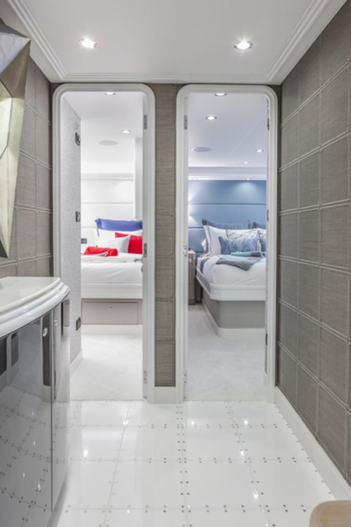 a bathroom with a glass door aboard HANNAH Yacht for Sale