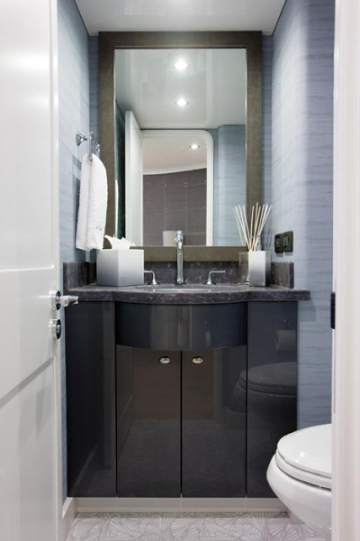 a bathroom with a sink and a mirror aboard HANNAH Yacht for Sale