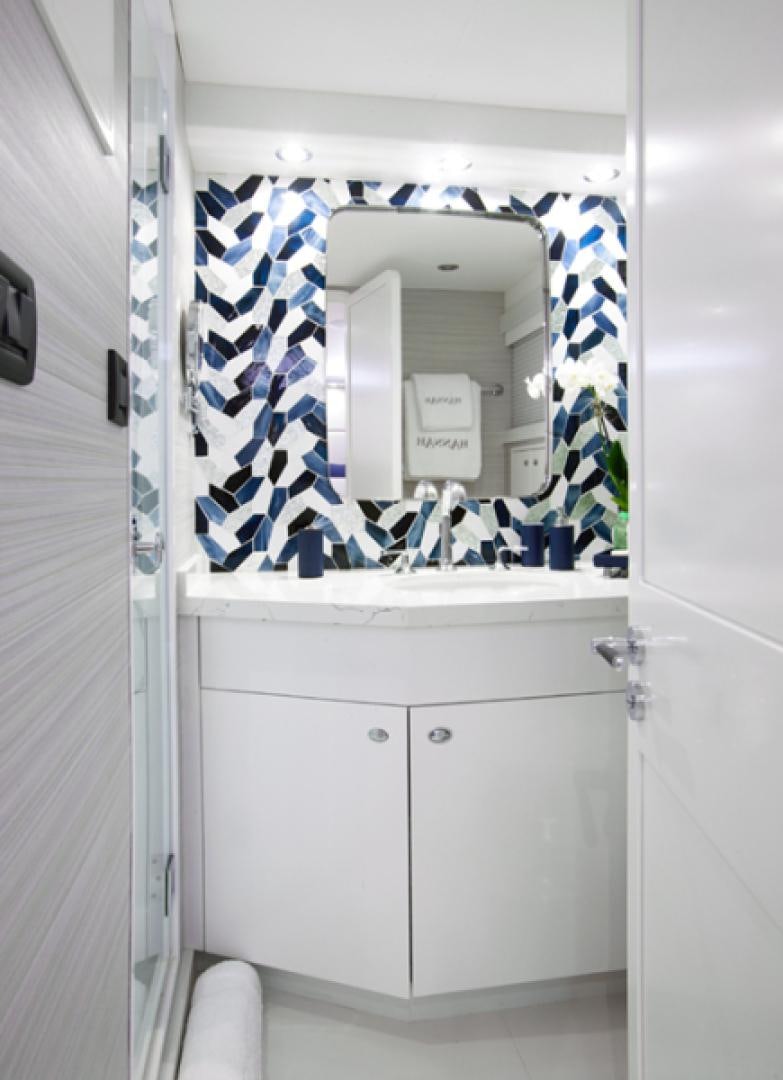 a bathroom with a mirror aboard HANNAH Yacht for Sale