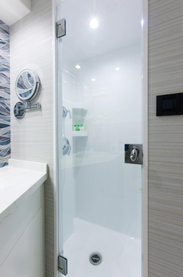 a shower unit with a glass door aboard HANNAH Yacht for Sale