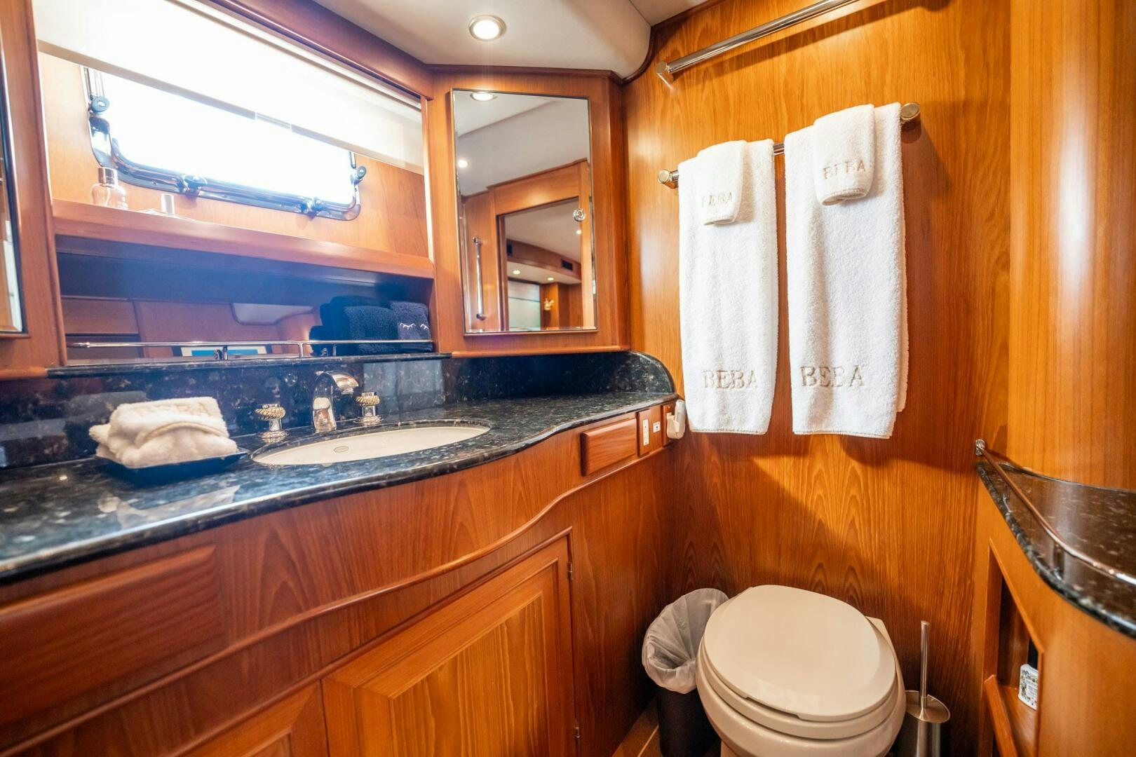 a bathroom with a sink and a toilet aboard BEBA Yacht for Sale