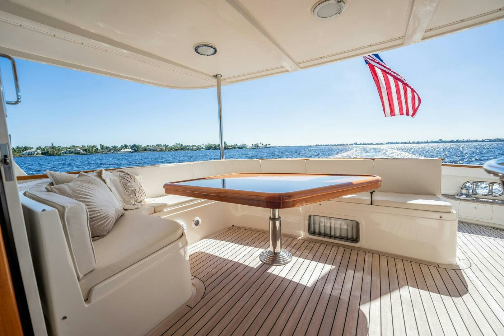 a table and a couch on a boat aboard BEBA Yacht for Sale