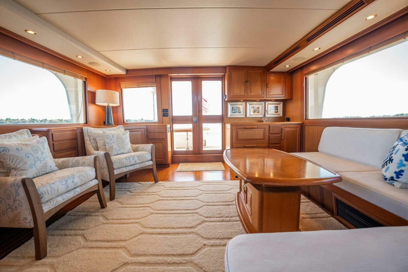 a living room with a couch and a table aboard BEBA Yacht for Sale