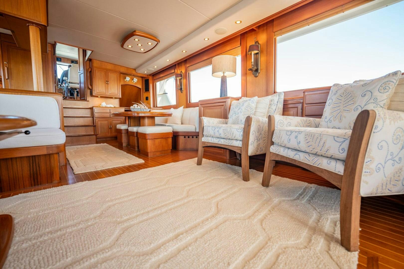 a living room with a couch and a table aboard BEBA Yacht for Sale