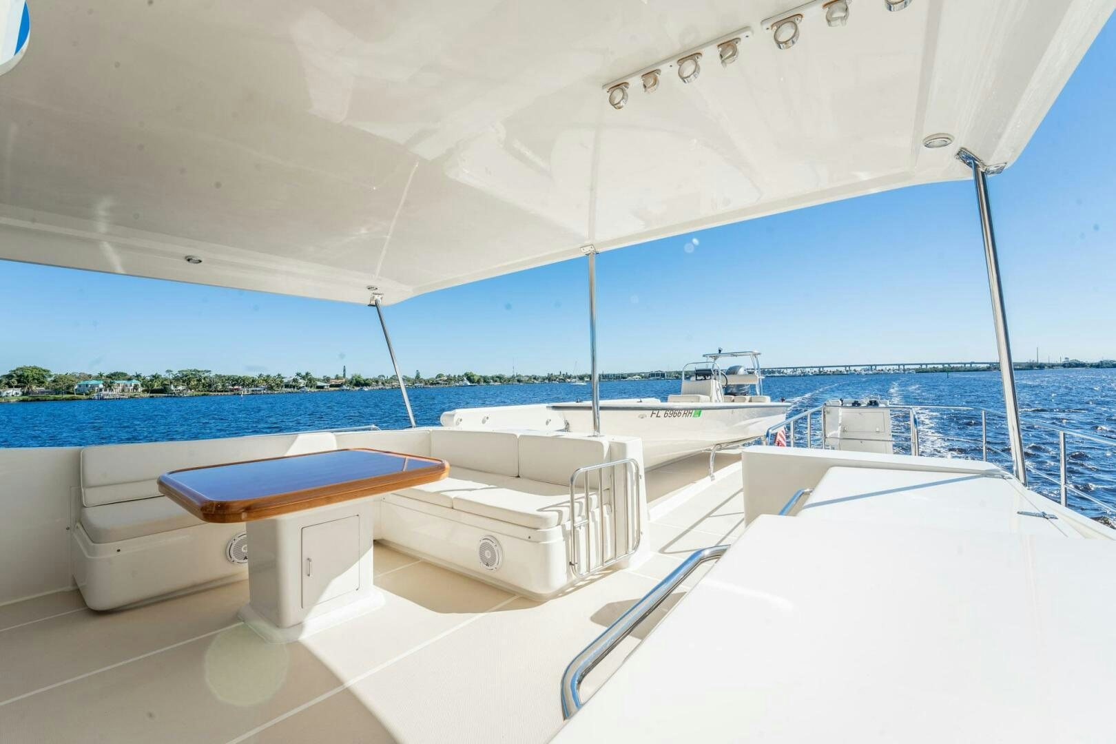 a white lounge chair on a boat aboard BEBA Yacht for Sale