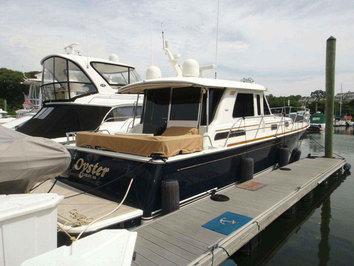 a boat docked at a pier aboard OYSTER Yacht for Sale