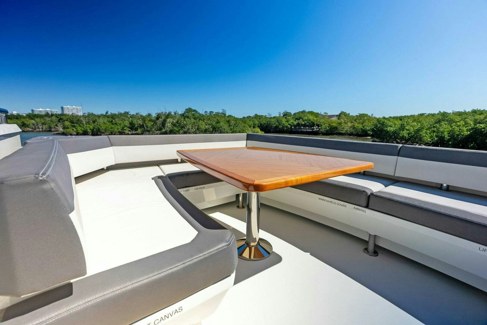 a table on a balcony aboard SUNNY SEAJAY Yacht for Sale