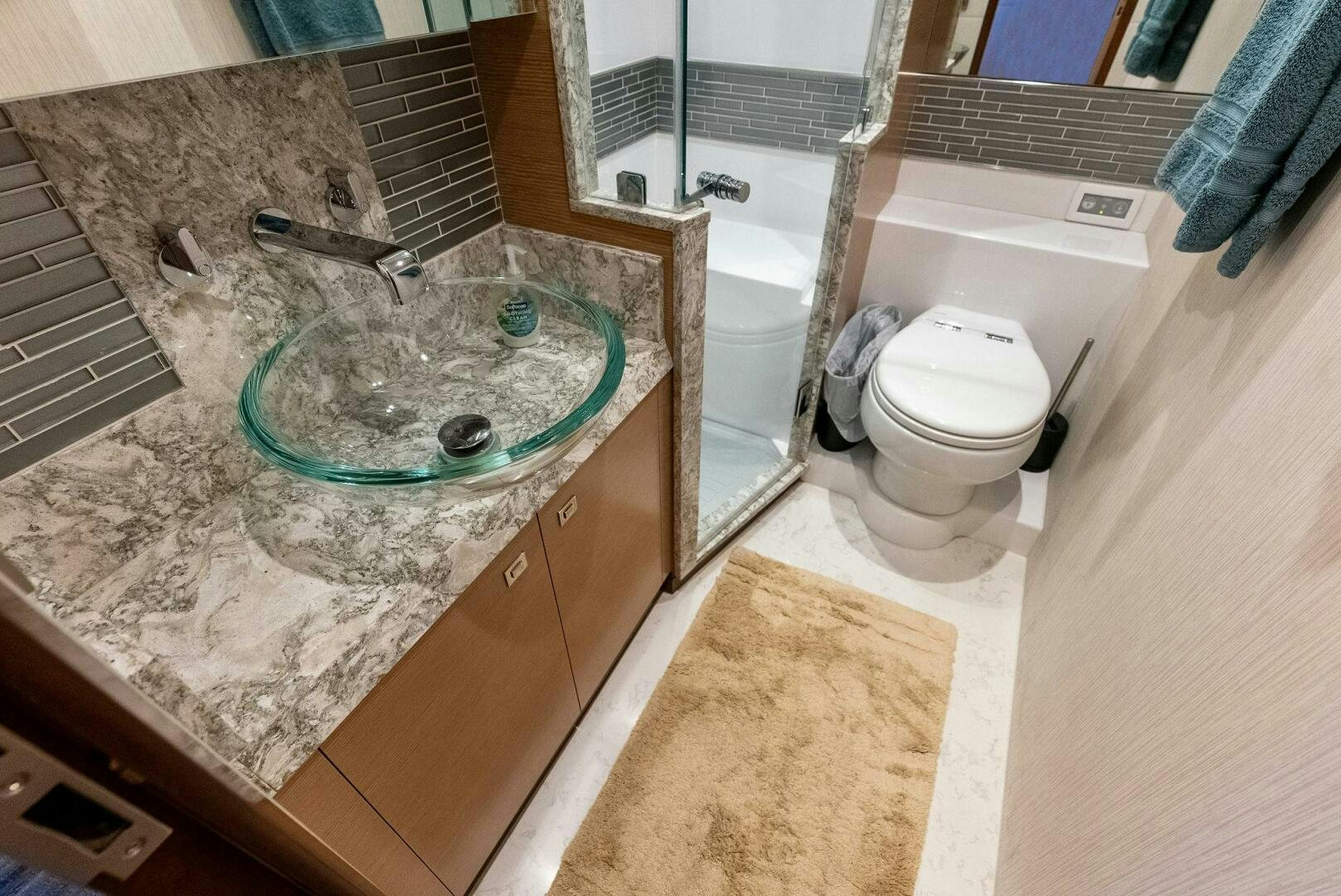 a bathroom with a sink and a toilet aboard SUNNY SEAJAY Yacht for Sale