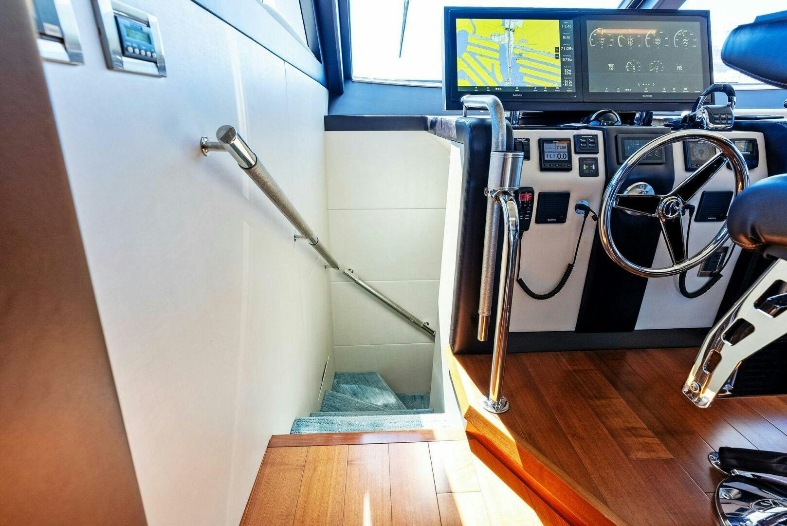 a room with a machine and a chair aboard SUNNY SEAJAY Yacht for Sale