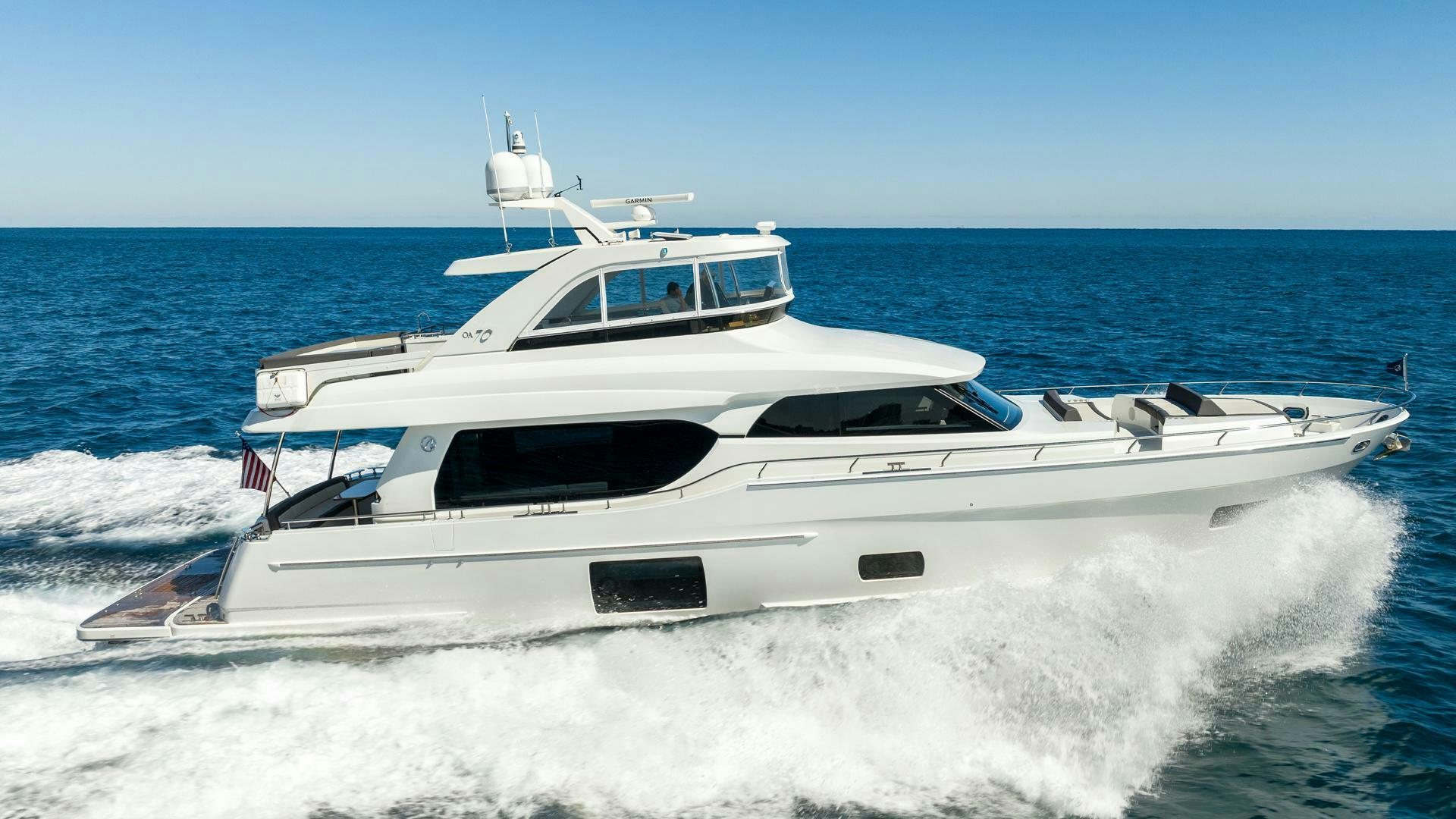 a white yacht on the water aboard SUNNY SEAJAY Yacht for Sale