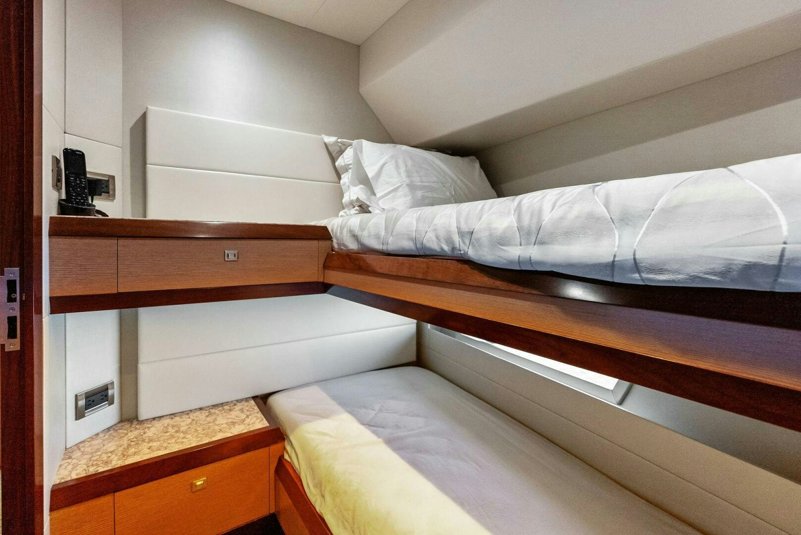 a bed with white sheets aboard SUNNY SEAJAY Yacht for Sale