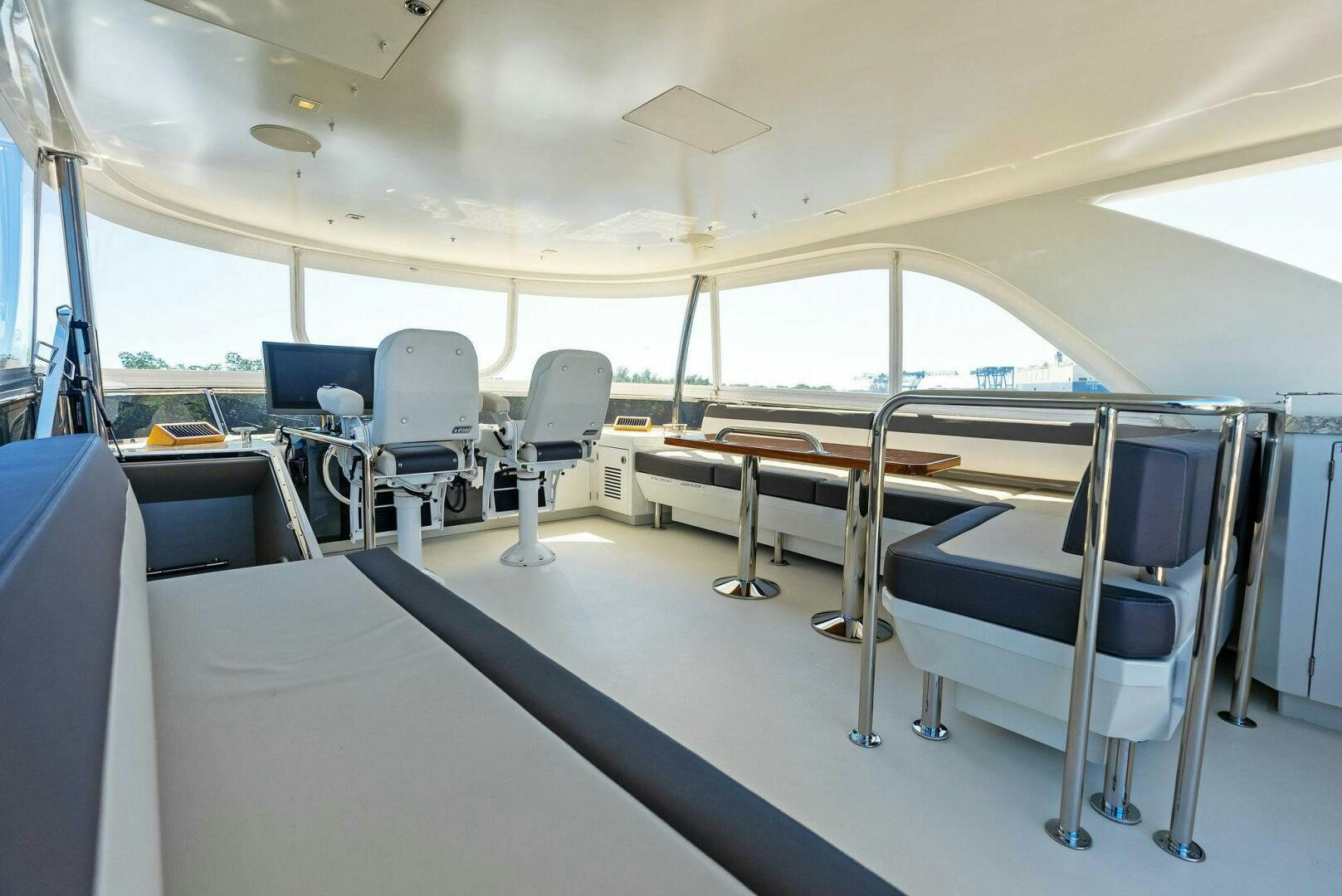 a room with a row of desks and chairs aboard SUNNY SEAJAY Yacht for Sale