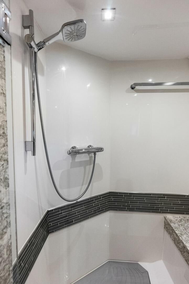 a shower with a glass door aboard SUNNY SEAJAY Yacht for Sale