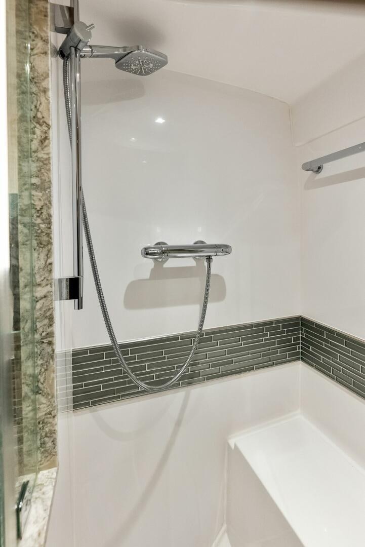 a shower with a glass door aboard SUNNY SEAJAY Yacht for Sale