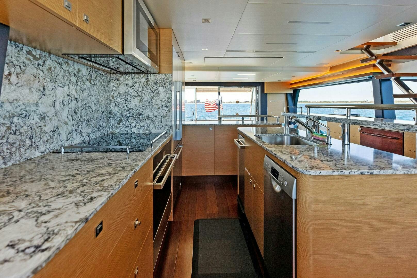 a kitchen with marble counters aboard SUNNY SEAJAY Yacht for Sale