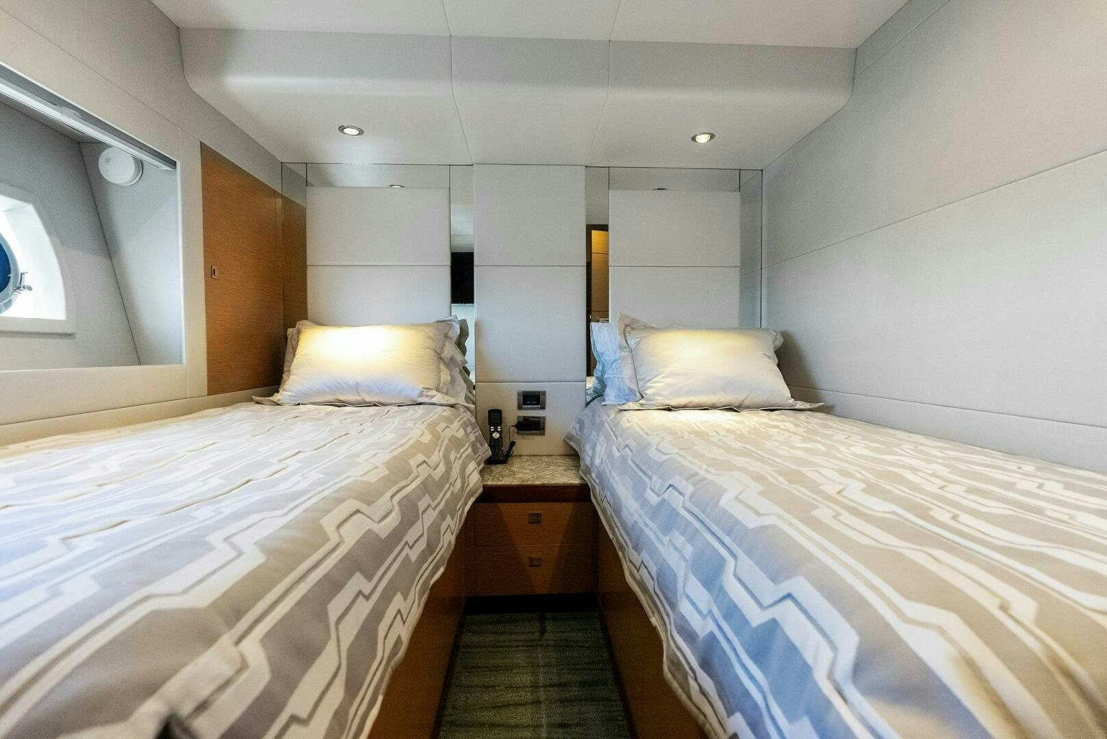 a couple of beds in a room aboard SUNNY SEAJAY Yacht for Sale