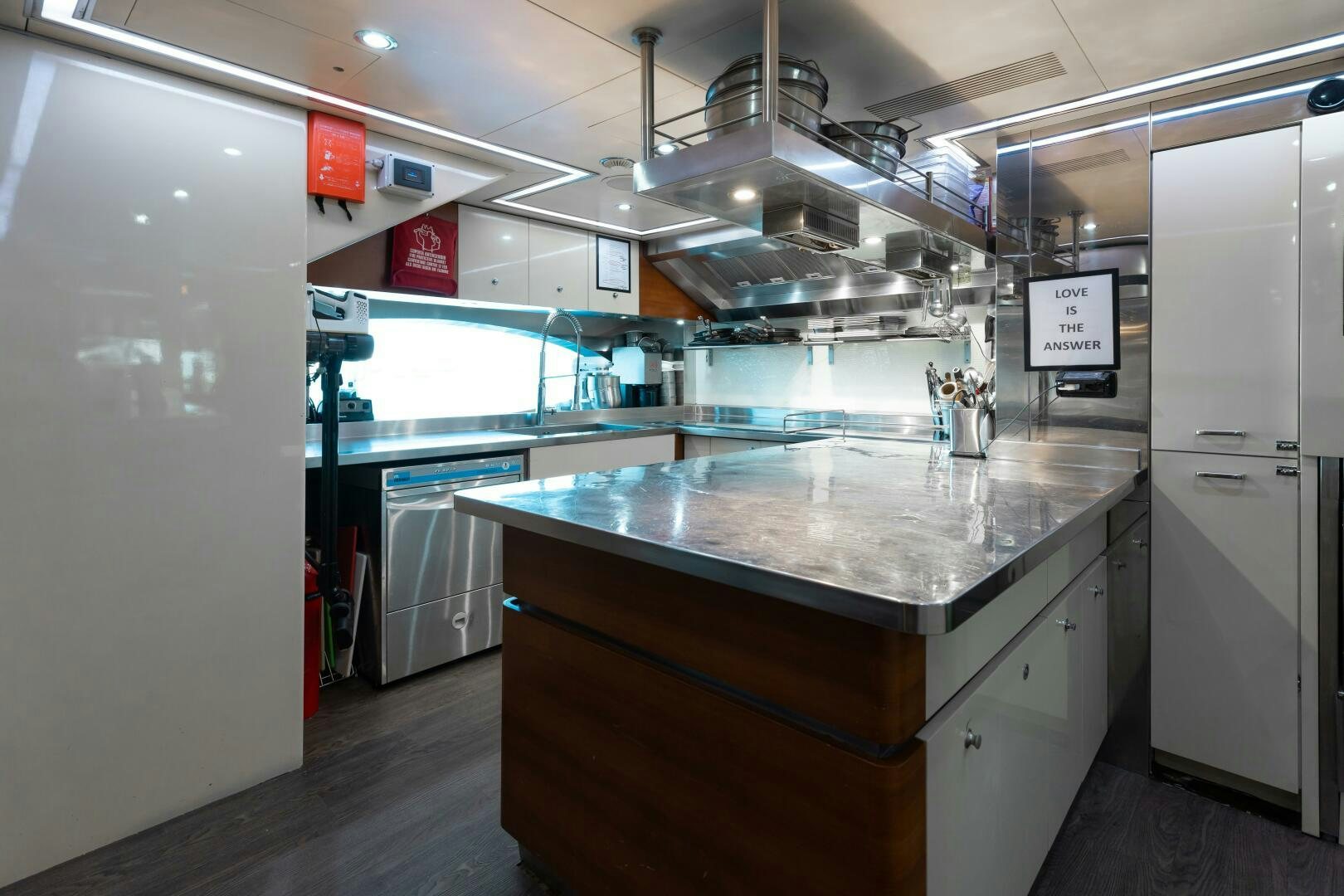 a kitchen with a countertop aboard Q Yacht for Sale