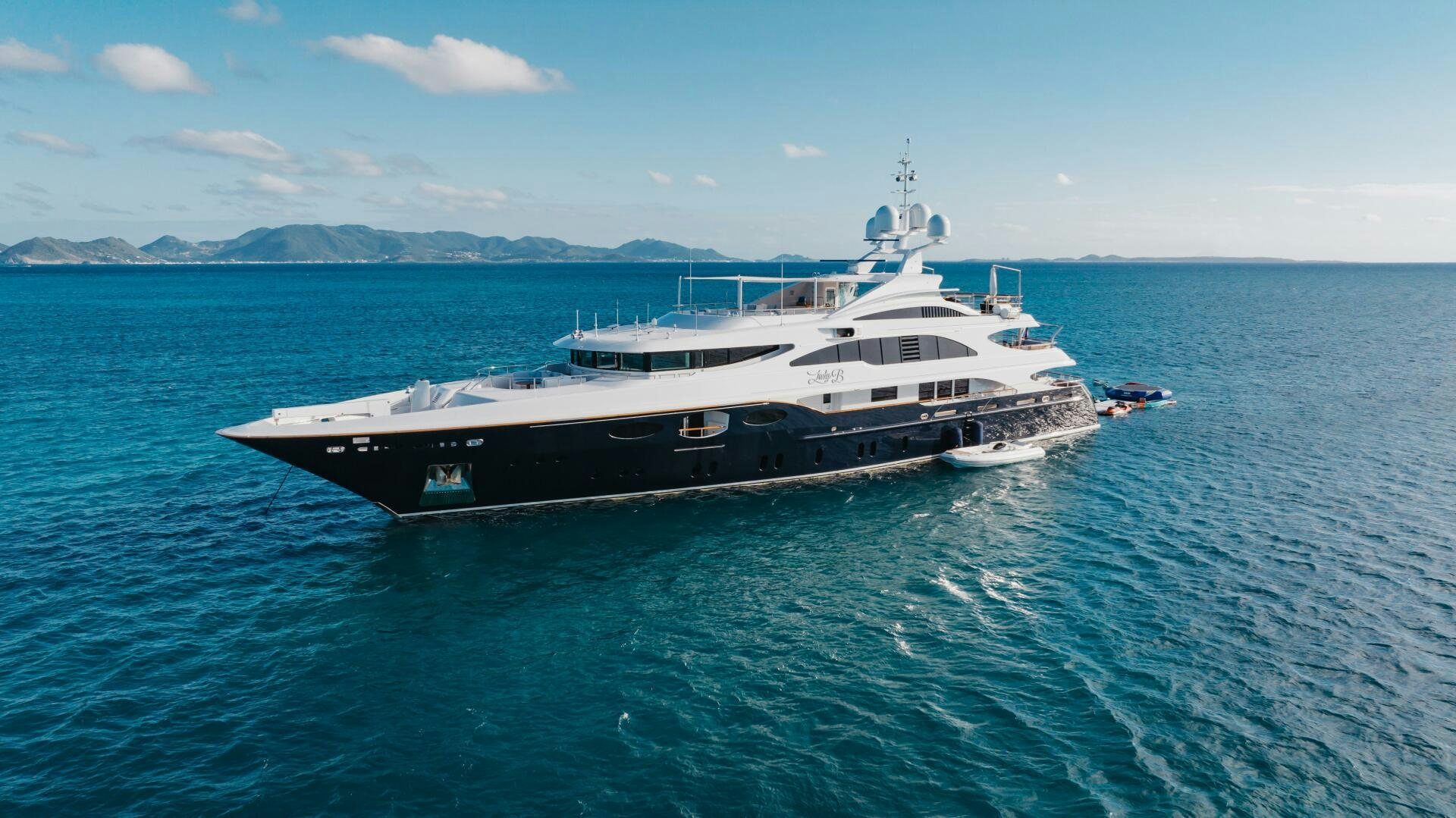 a large boat in the water aboard Q Yacht for Sale