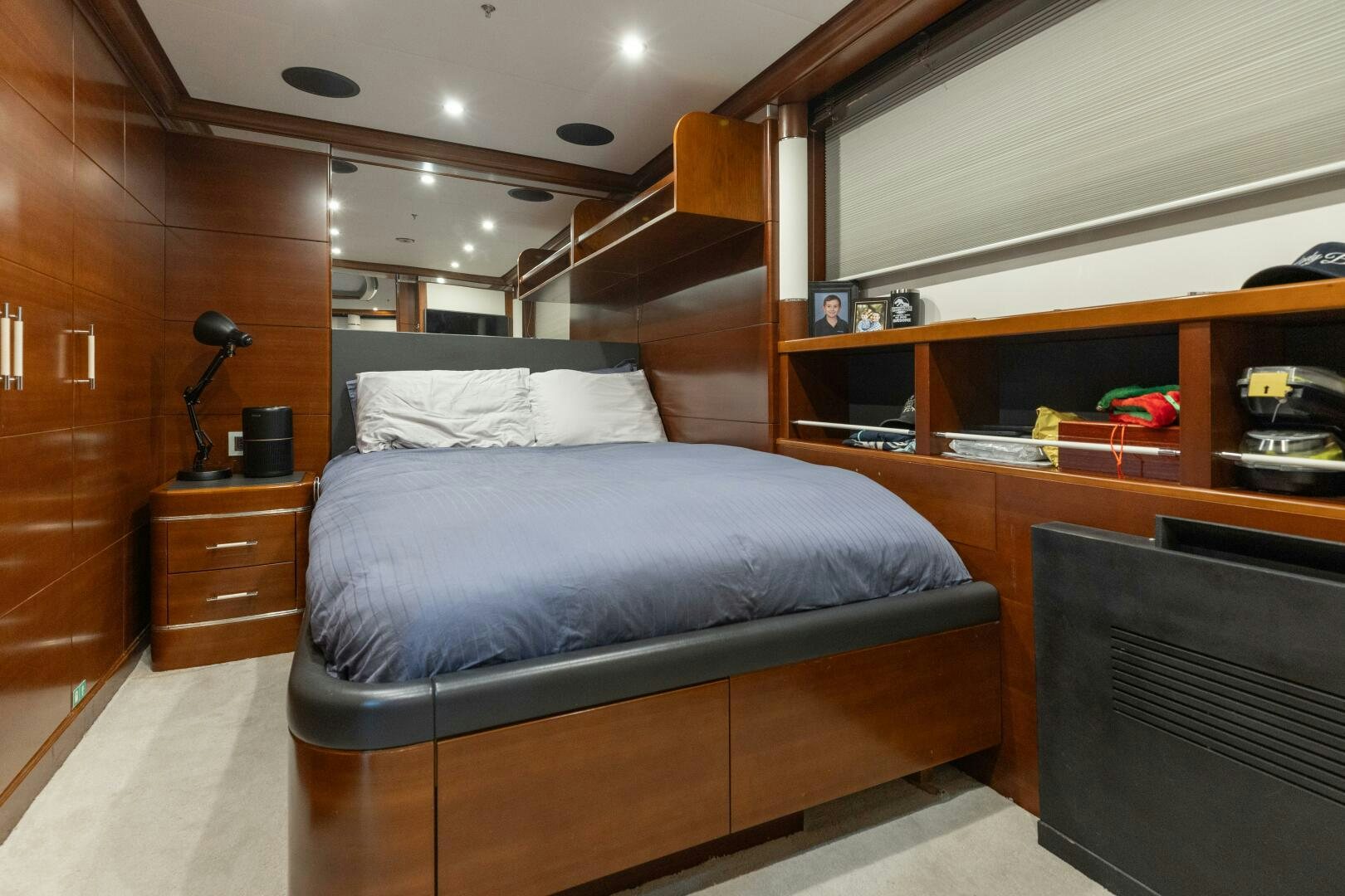 a bed in a room aboard Q Yacht for Sale