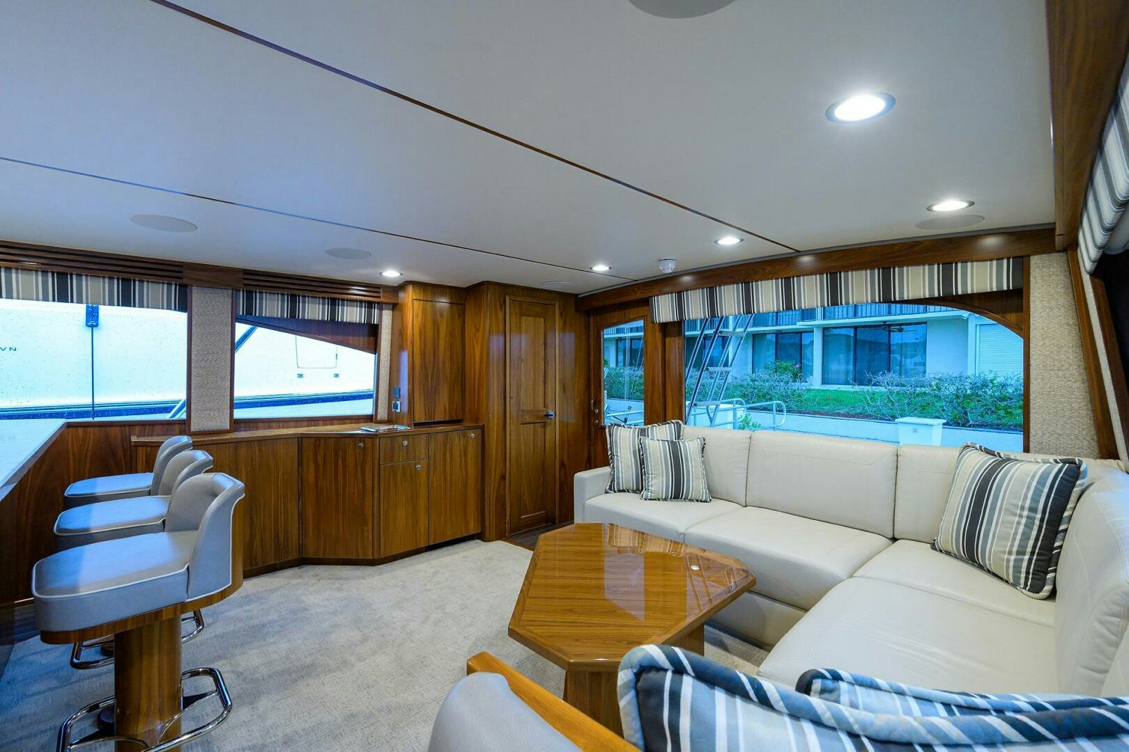 a living room with a couch and a table aboard SNOWBIRD Yacht for Sale