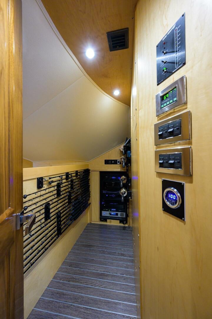 a hallway with a staircase and a door aboard SNOWBIRD Yacht for Sale