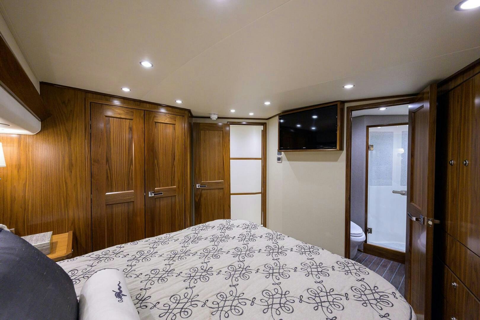 a bedroom with a large bed aboard SNOWBIRD Yacht for Sale