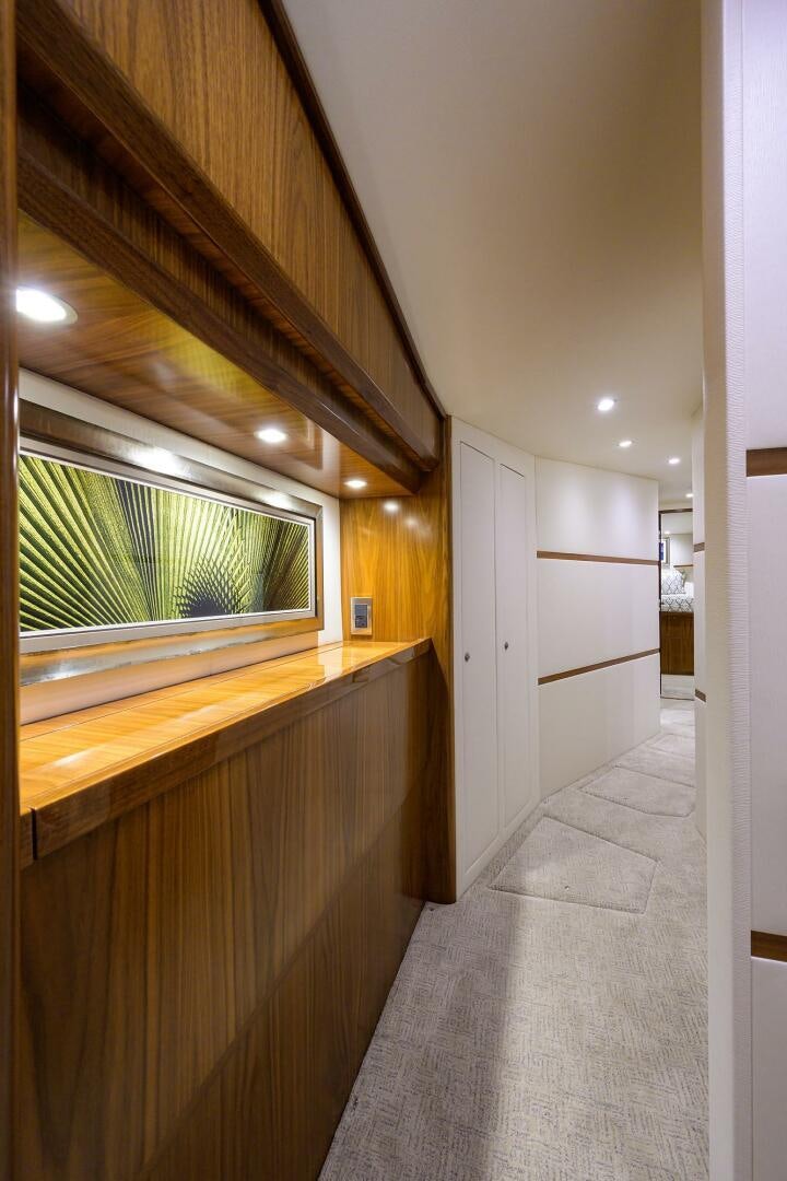 a hallway with a countertop and cabinets aboard SNOWBIRD Yacht for Sale