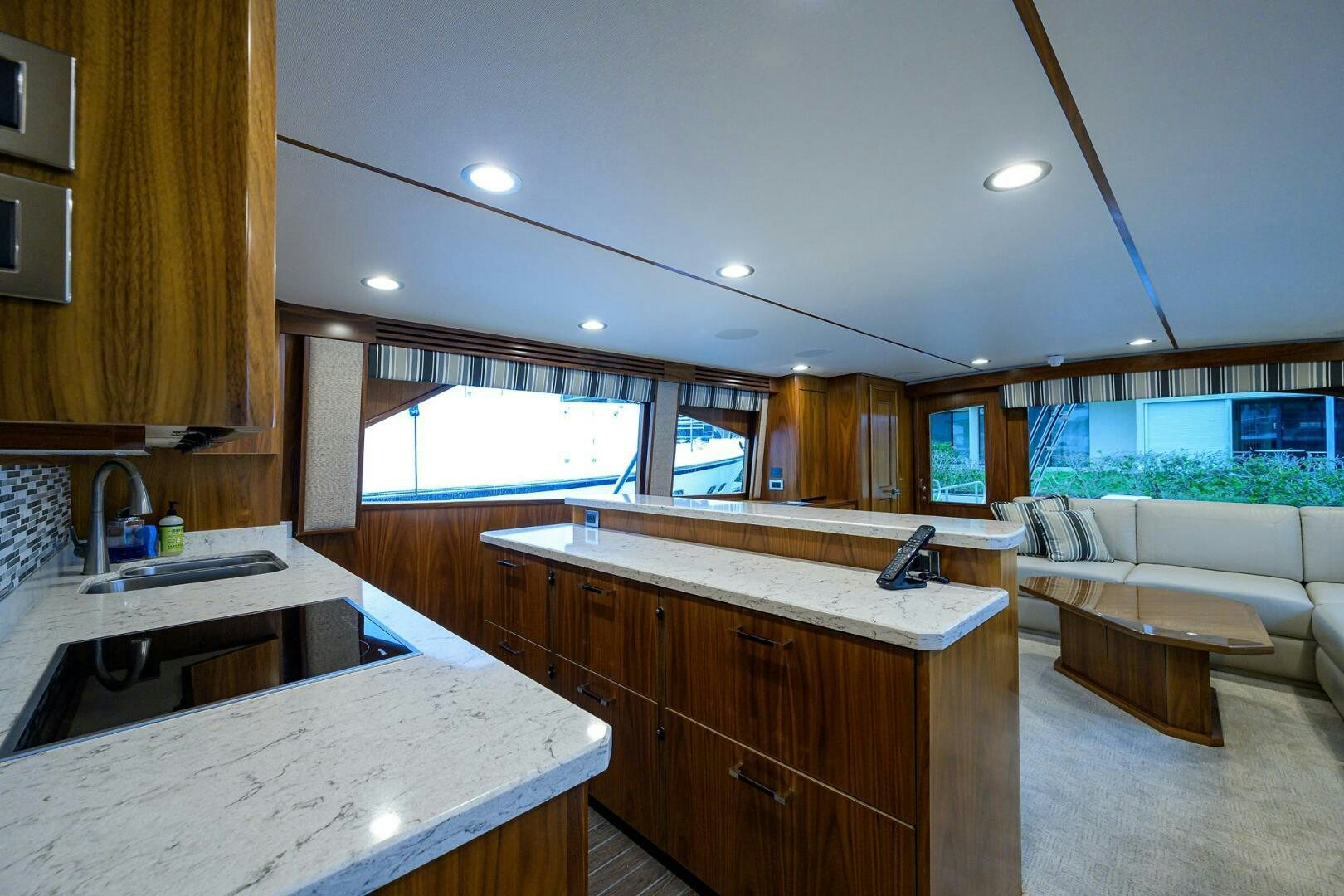 a kitchen with a large island aboard SNOWBIRD Yacht for Sale