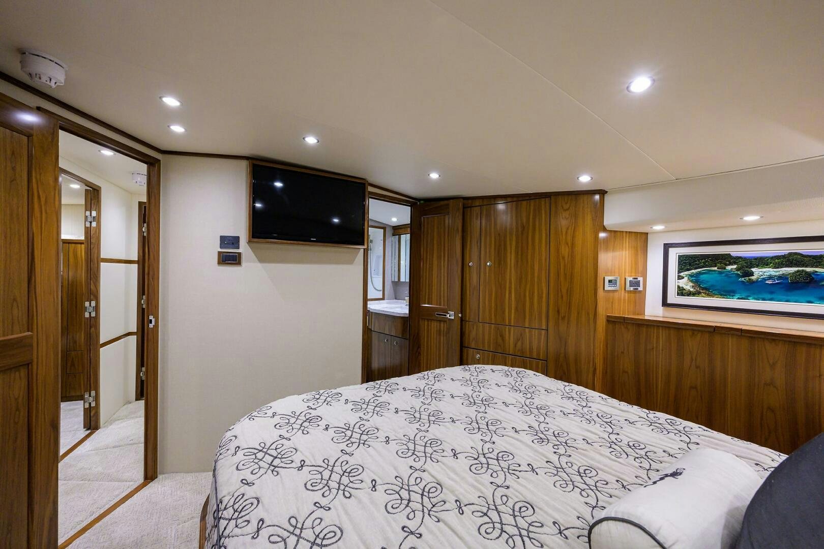 a bedroom with a large bed aboard SNOWBIRD Yacht for Sale