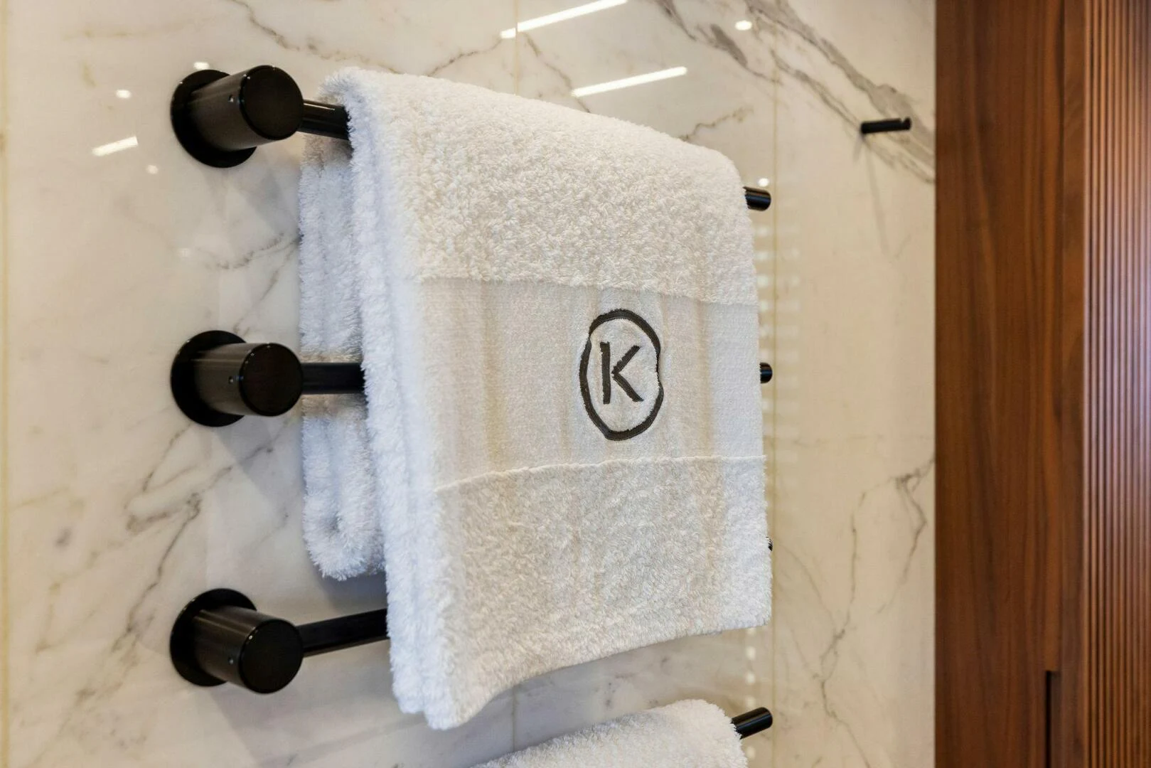 a towel on a wall aboard KAMAKASA Yacht for Sale