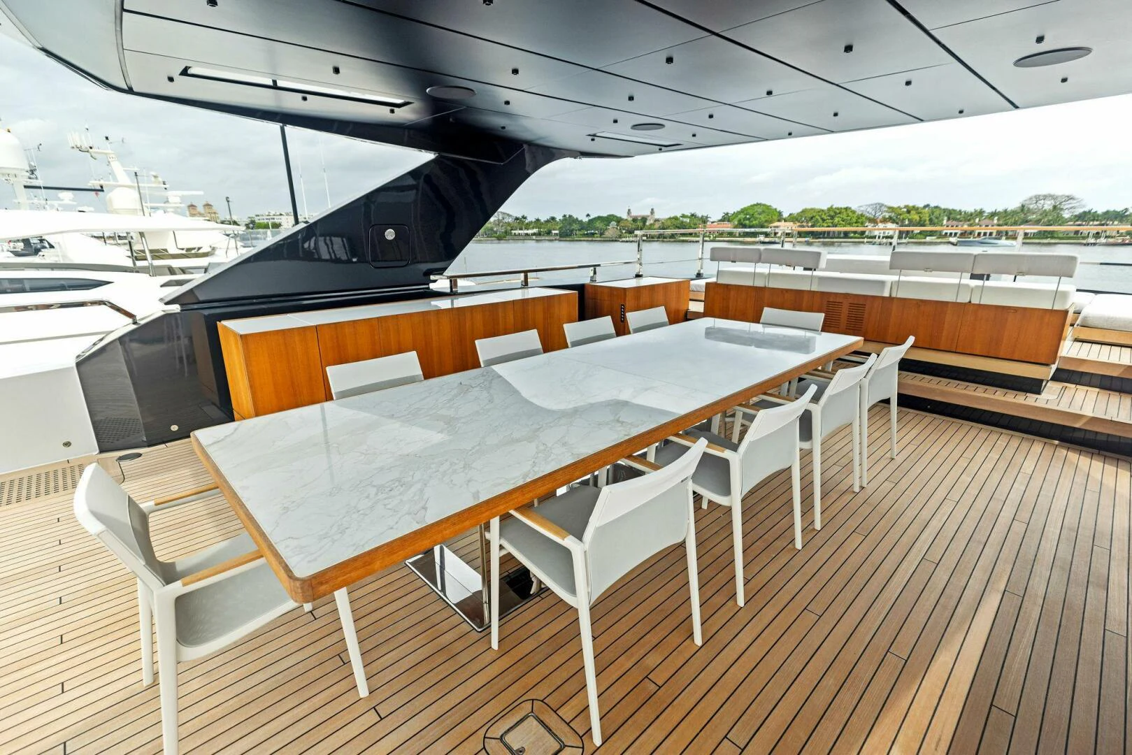 a table with chairs around it aboard KAMAKASA Yacht for Sale