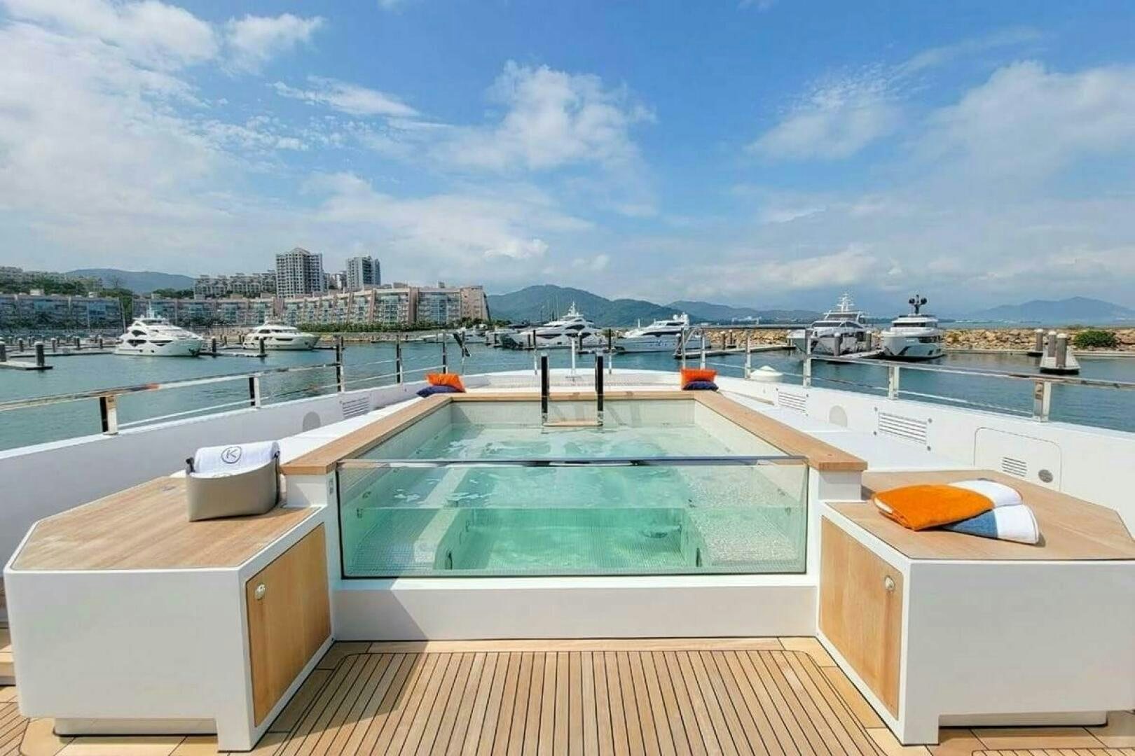 a large swimming pool aboard KAMAKASA Yacht for Sale