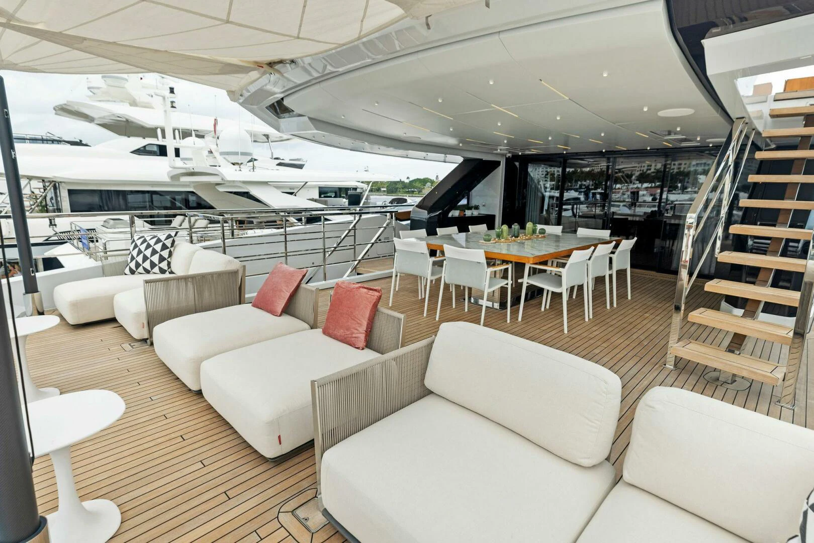 a room with couches and tables aboard KAMAKASA Yacht for Sale
