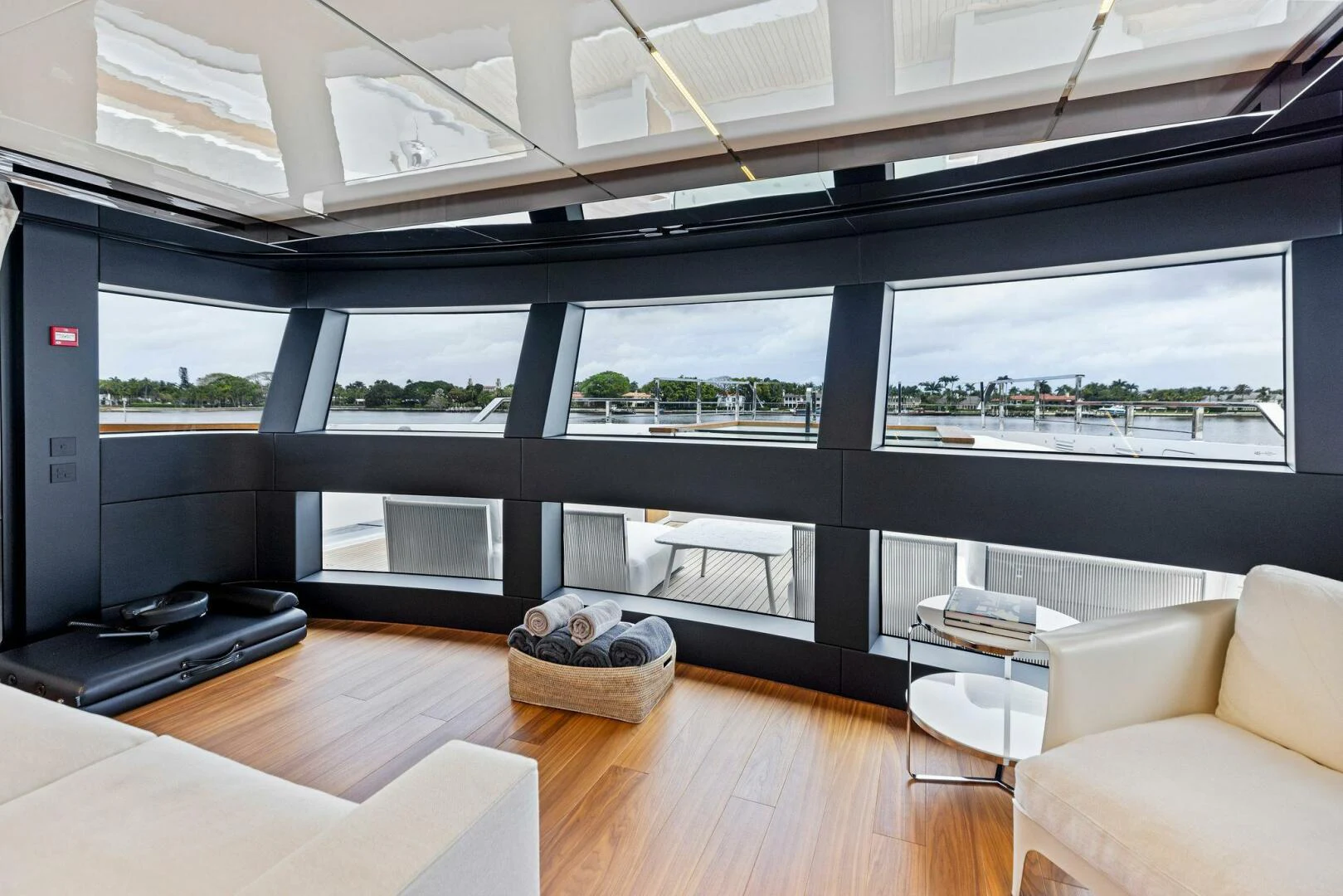 a room with a large window aboard KAMAKASA Yacht for Sale