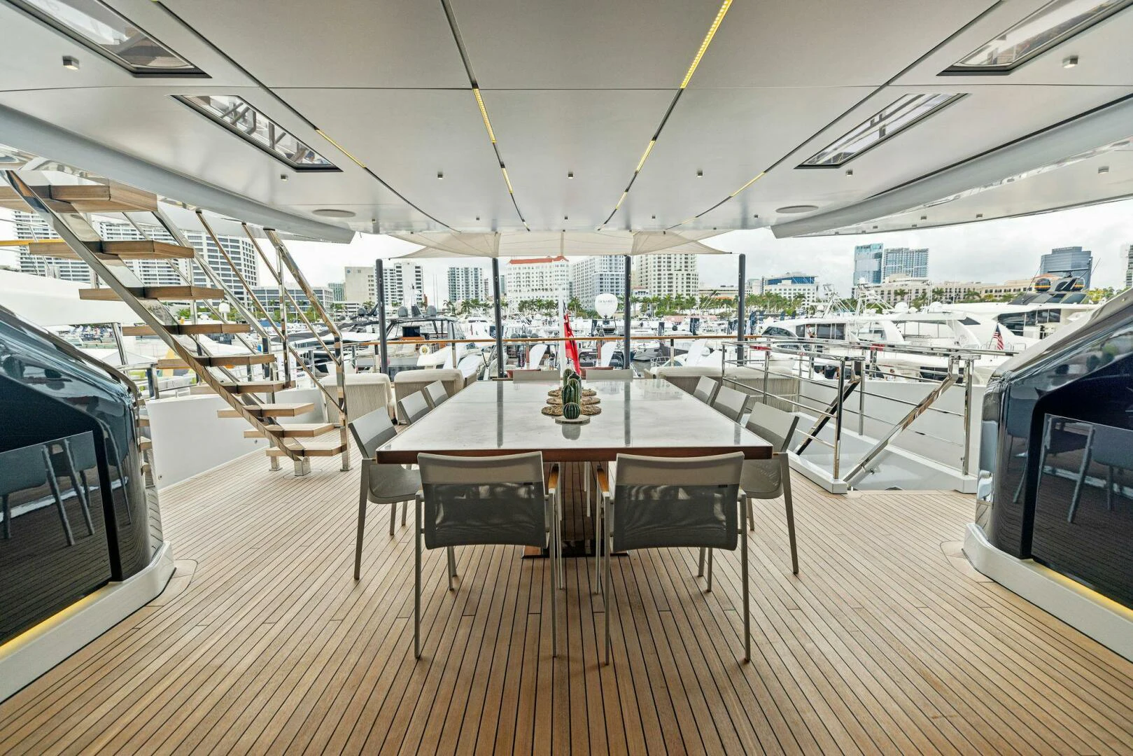 a table in a room aboard KAMAKASA Yacht for Sale