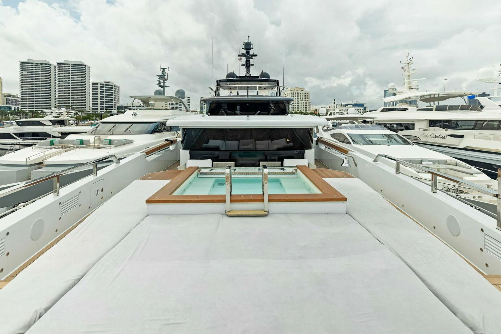 a group of boats in a harbor aboard KAMAKASA Yacht for Sale