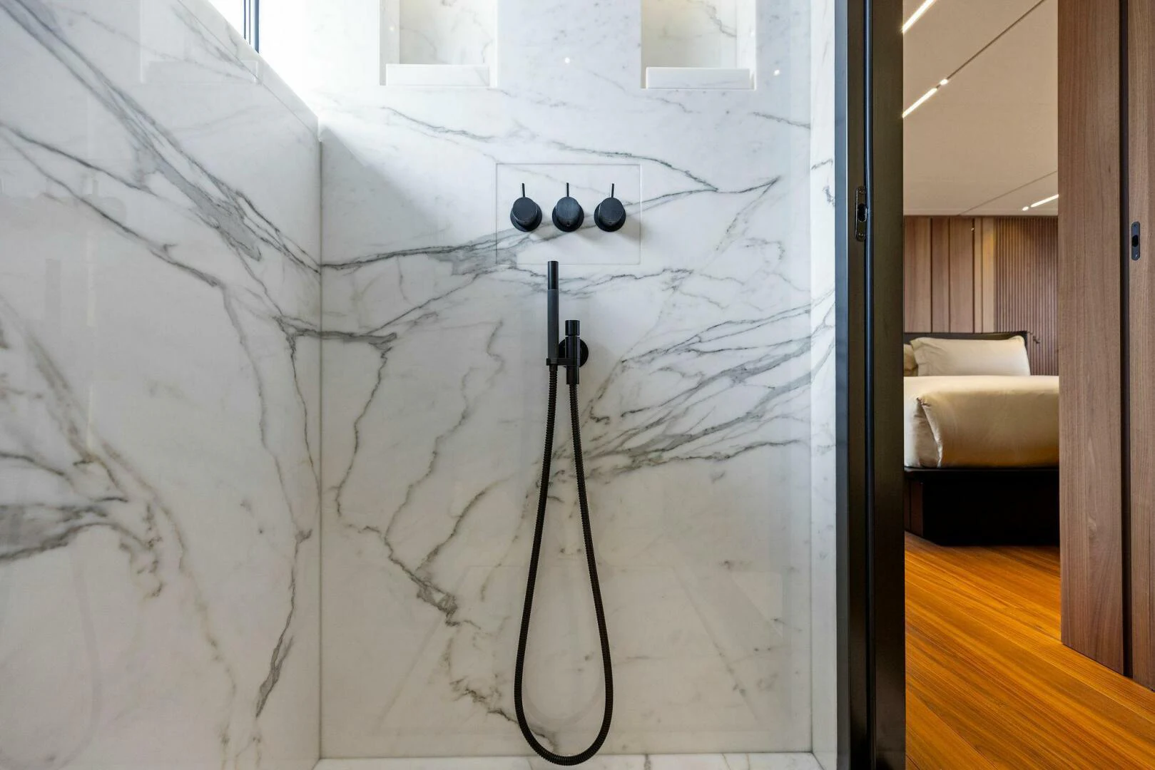 a shower with a shower curtain aboard KAMAKASA Yacht for Sale